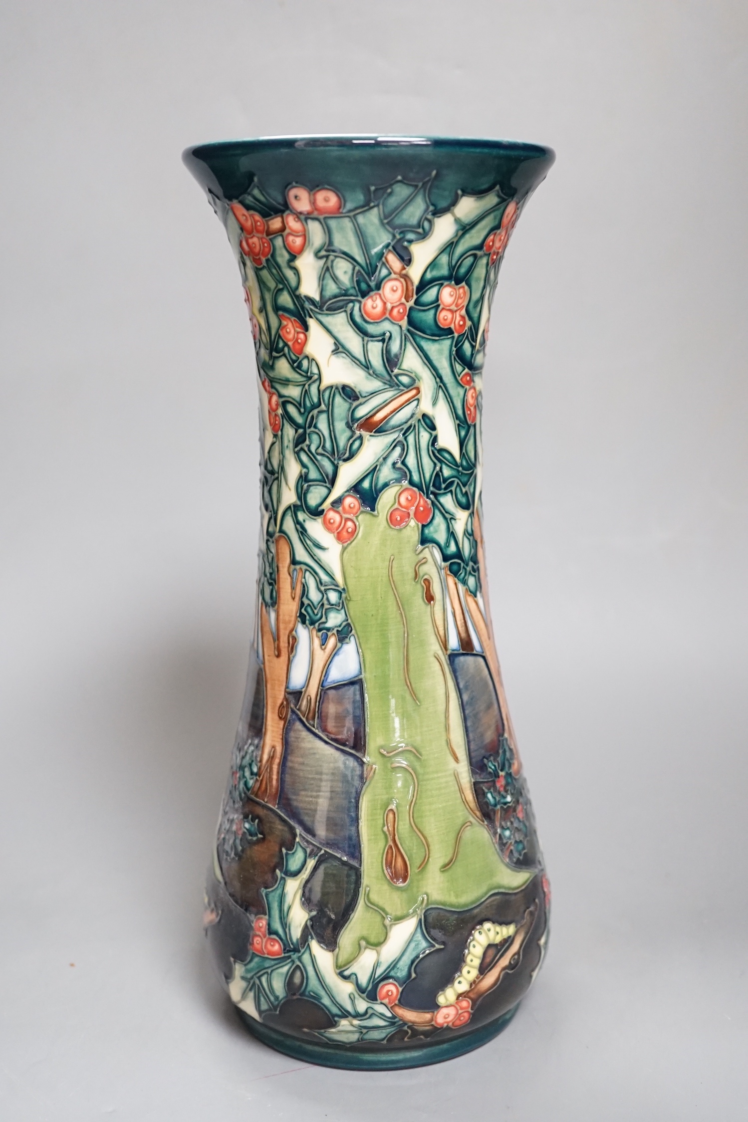 A Moorcroft vase with woodland scene - 30cm high